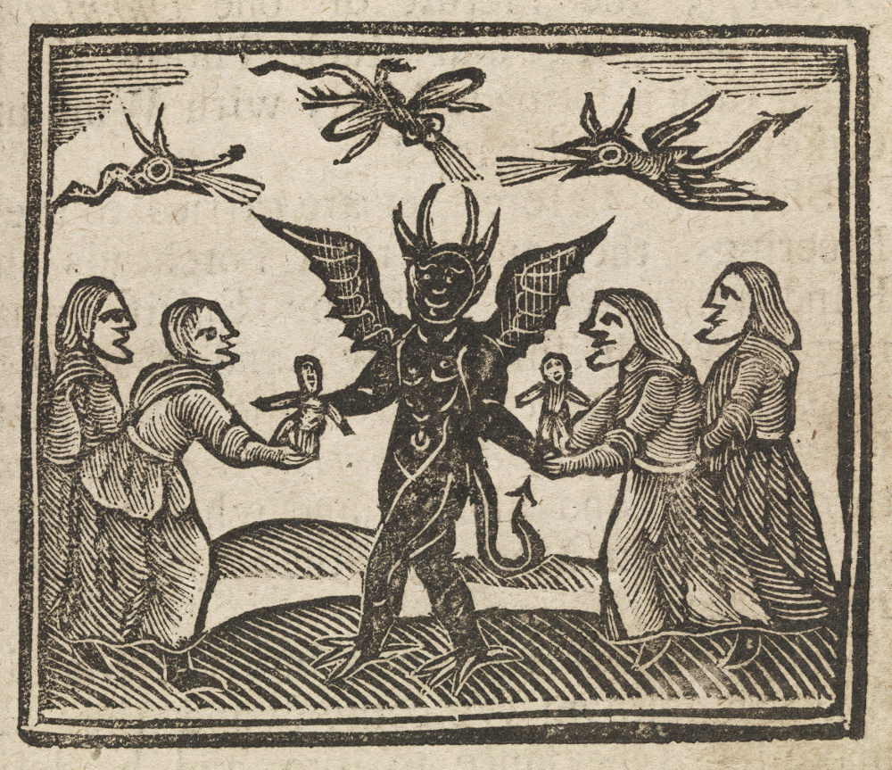 Witches presenting wax dolls to the devil